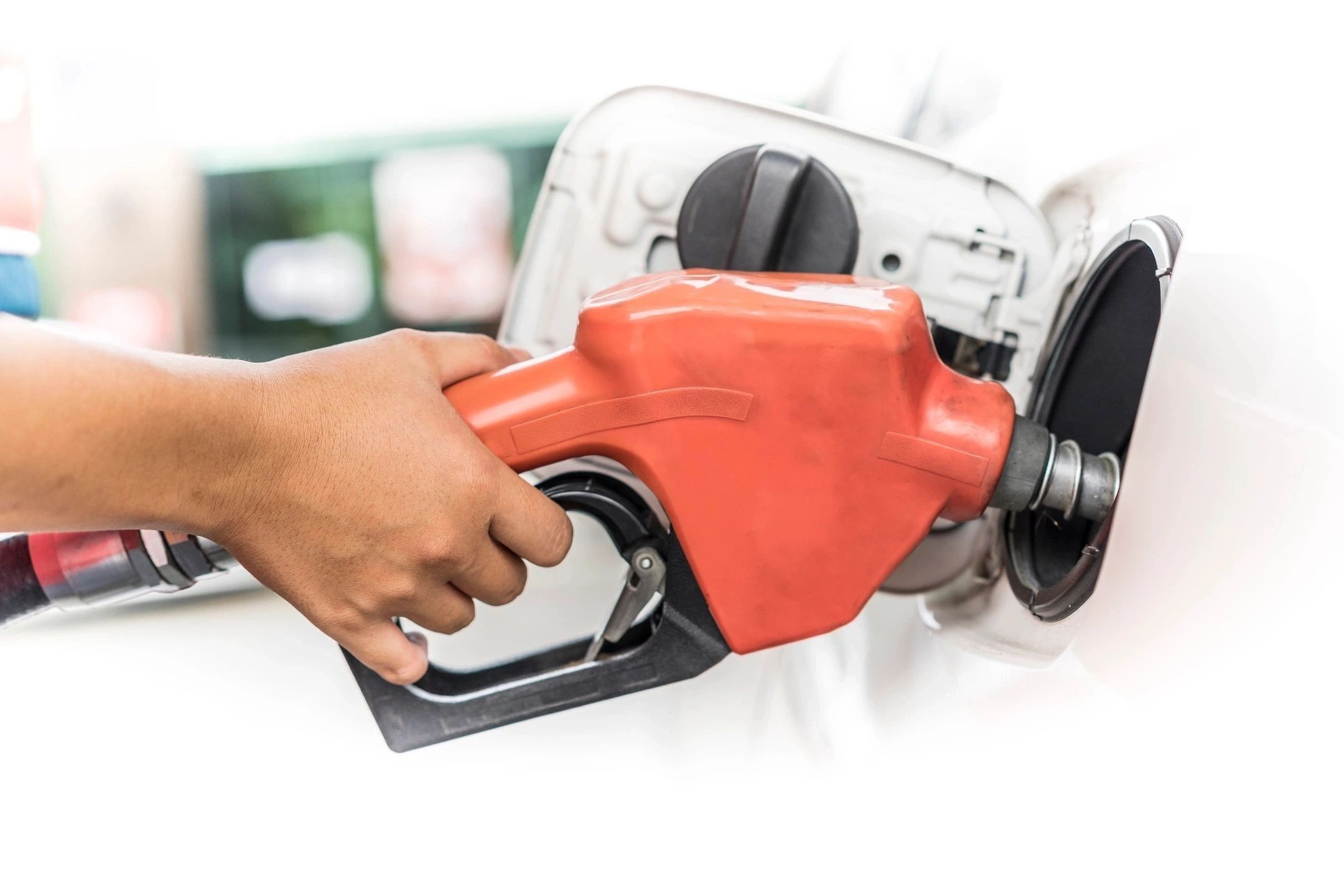 A customer refueling a vehicle